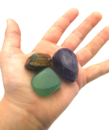 Green Aventurine Tumbled Stone crystal  in kids hand